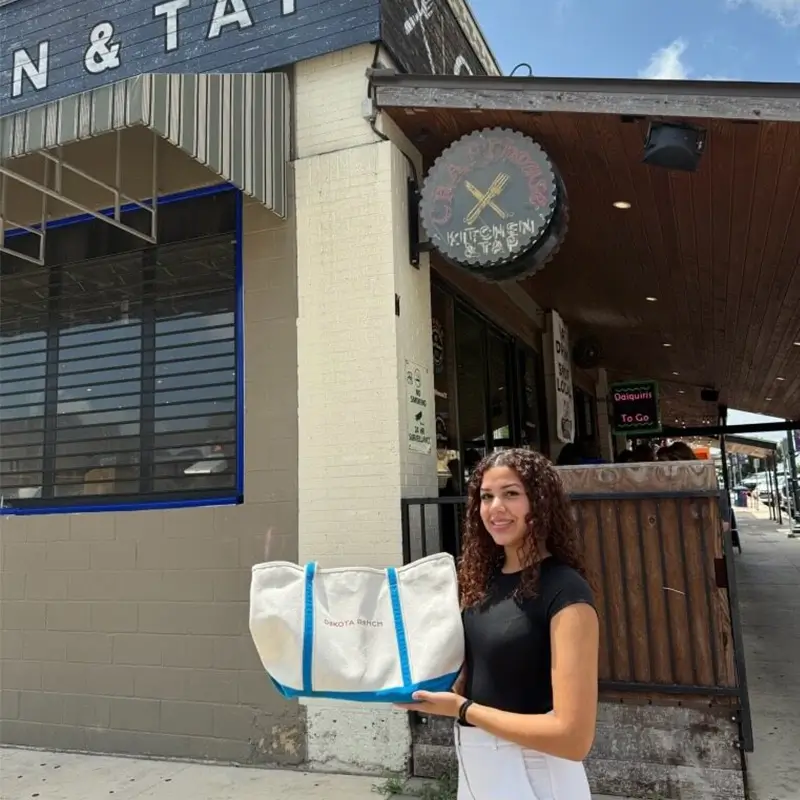 young woman outside of a restaurant